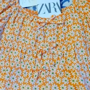 Zara Girl Orange with White daisies S/Sleeve Square Neck Romper Size 6